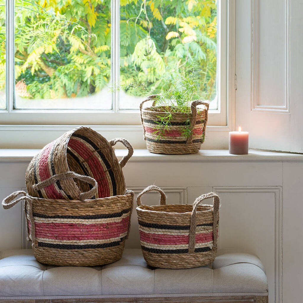 Woven Baskets With A Pink Stripe