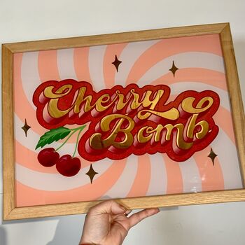 'Cherry Bomb' Reverse Glass Gold Leaf Wall Art Sign, 11 of 12