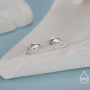 Tiny Dolphin Stud Earrings In Sterling Silver, 2 of 12