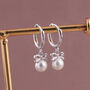 Sterling Silver Pearl Hoop Earring With Bow Design, thumbnail 1 of 8