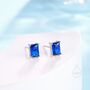 Sterling Silver Emerald Cut Sapphire Blue Cz Stud Earrings, thumbnail 1 of 12