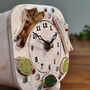 Ceramic Clock With Jumping Dogs In Chocolate Brown And Cream Yellow, thumbnail 4 of 8