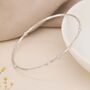 Hammered Sterling Silver Bangle With White Opals, thumbnail 1 of 7
