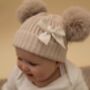 Cream Double Pom Pom Baby Hat With Ribbon Bow, thumbnail 1 of 5