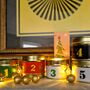 Advent Calender Tins With Candles And Treats, thumbnail 1 of 9