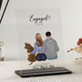 Personalised “Engaged” Acrylic Plaque – Couple And Pets Illustration, thumbnail 1 of 11