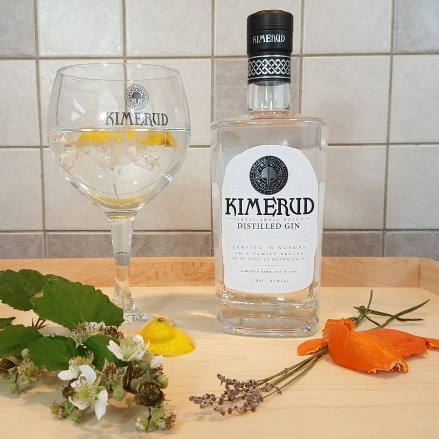 norwegian kimerud gin with branded gin glass by green island
