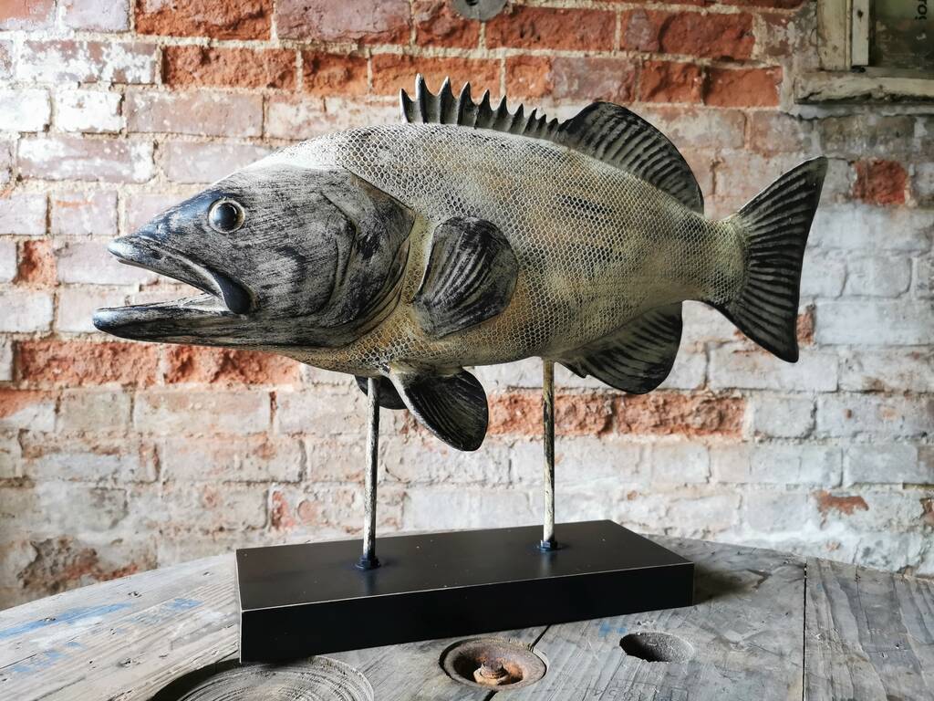 https://cdn.notonthehighstreet.com/fs/90/56/9c92-bd99-43f0-95a8-fbbe6eeb72f3/original_wooden-carved-fish-sculpture.jpg