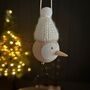 Wooden Bird In White Pompom Hat Hanging Decoration, thumbnail 1 of 2