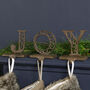 Set Of Three Joy Christmas Stocking Hangers, thumbnail 3 of 6