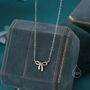 Sterling Silver Delicate Ribbon Bow Pendant Necklace, thumbnail 1 of 12