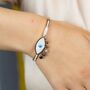 Evil Eye White Sequin 18ct Plated Gold Arm Bangle, thumbnail 1 of 5