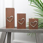 Wooden Tea Light Holders Raised Love Heart Design, thumbnail 1 of 9