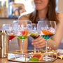 Set Of Four Coloured Gin Glasses With Phrases, thumbnail 1 of 4
