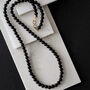 Mens Extra Long Brass And Black Onyx Crystal Necklace, thumbnail 1 of 3