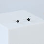 Sterling Silver Tiny Black Star Studs, thumbnail 3 of 4