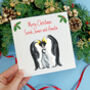 Personalised Penguin Family First Christmas Card, thumbnail 1 of 8