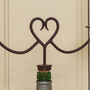 Iron Anniversary Heart Bottle Stopper And Candle Holder, thumbnail 4 of 8