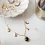 Gold Plated Black Obsidian Moon And Stars Necklace, thumbnail 3 of 5