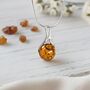 Handmade Oval Baltic Amber Silver Necklace Pendant, thumbnail 1 of 3