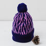 Lambswool Knitted Zebra Pom Pom Hat, thumbnail 3 of 12