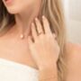 Two Ct Oval Solitaire Moissanite Engagement Ring With Pavé Band, thumbnail 6 of 9
