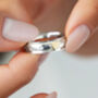 Elegant Slim Silver Spinner Ring With Golden Heart, thumbnail 1 of 4