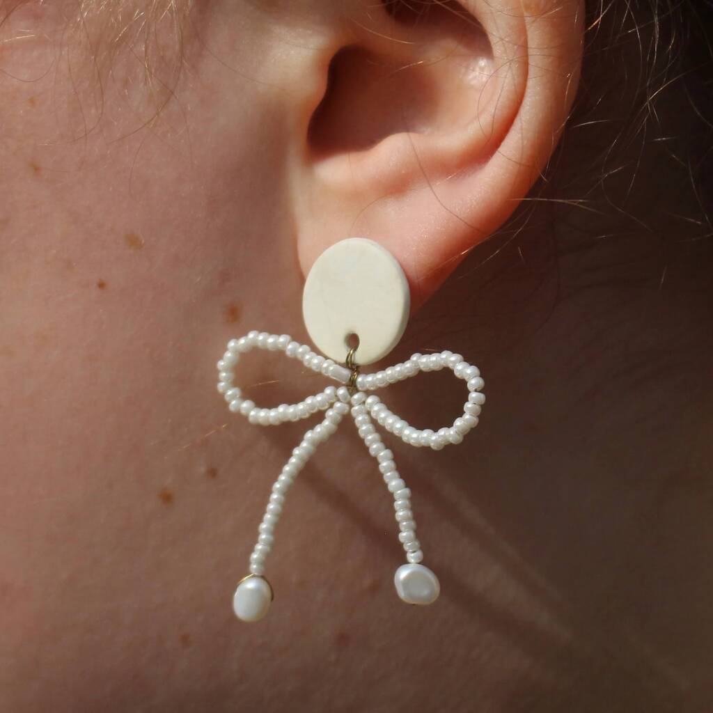 White Porcelain Earrings With Beaded Bow And Pearls, 1 of 3