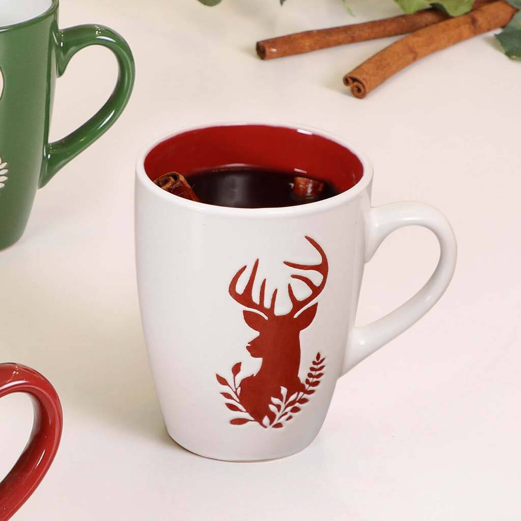 Set Of Four Christmas Reindeer Mugs By Dibor