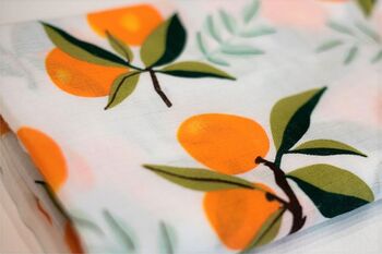 Orange Clementine Cotton Muslin Swaddle Blanket, 2 of 3