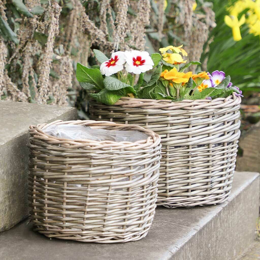 set of two round woven wicker planters by dibor | notonthehighstreet.com