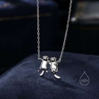 Tiny Otter Holding Hands Necklace, 5 of 11