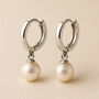Sterling Silver Round Pearl Huggie Hoop Earrings, thumbnail 1 of 5