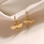 Gold Dragonfly Huggie Hoop Earrings, thumbnail 1 of 3