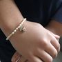 Girl's Pearl Bracelet With Sterling Silver Heart Charm, thumbnail 1 of 3