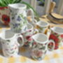 Set Of Six Cream Jugs In Assorted Floral Designs, thumbnail 8 of 10