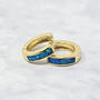 Dainty Blue Fire Opal Inlay Gold Plated Huggie Earrings, thumbnail 1 of 4