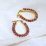 Gold Oval Hoop Earrings With Garnet Gemstones, thumbnail 3 of 5