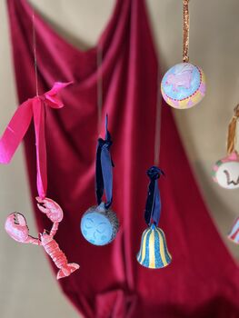 Stripped Hand Painted Ceramic Bell Bauble In Golden Yellow With Sparkly Turquoise Detail, 6 of 10