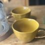 Mustard Scalloped Mug With A Gold Handle, thumbnail 1 of 3