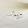 Sterling Silver Infinity Symbol Stud Earrings, thumbnail 1 of 4
