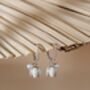 White Enamel Lily And Pearl Huggie Hoop Earrings, thumbnail 6 of 7