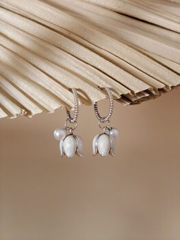 White Enamel Lily And Pearl Huggie Hoop Earrings, 6 of 7