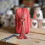 Single Zip Cross Body Bag With Tassel In Coral, thumbnail 2 of 3