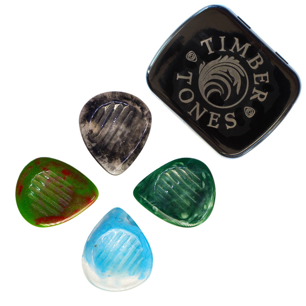 Resin Guitar Picks With A Grip Pattern On One Side By Timber Tones