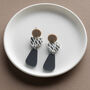 Sterling Silver Grey Nude Pebble Shaped Dalmatian Studs, thumbnail 1 of 6
