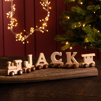 Personalised First Christmas Wooden Name Train, 2 of 12