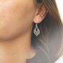 Sterling Silver Fleur De Lis Dangly Earrings, thumbnail 2 of 6