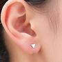Sterling Silver Tiny Triangle Huggie Hoop Earrings, thumbnail 1 of 12