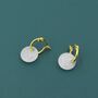 Sterling Silver Genuine White Jade Donut Huggie Hoop Earrings, thumbnail 2 of 11